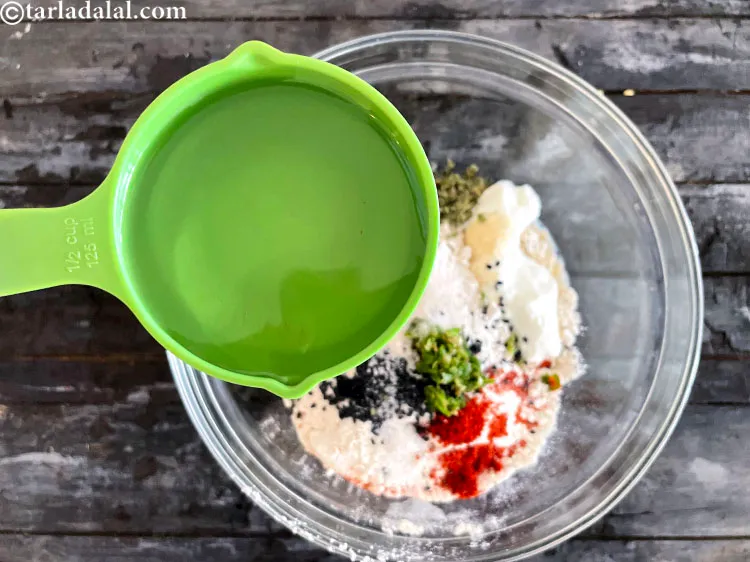 Step 20 – Add 1/4 cup water to make a stiff dough.