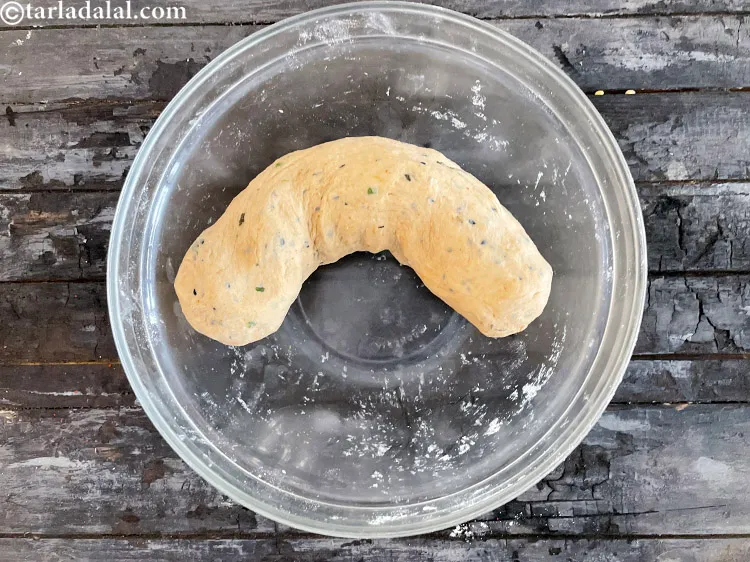 Step 22 – Shape dough into a rope shape so it&#39;s easy to make 20 portions.