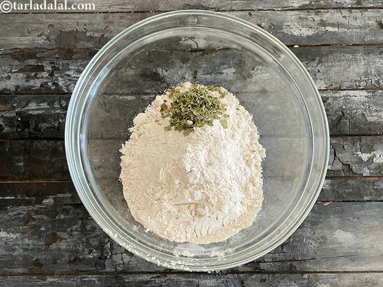 Step 12 – Add&nbsp;<meta charset="UTF-8" />2 tsp&nbsp;<a href="glossary-dried-fenugreek-leaves-kasuri-methi-374i">dried fenugreek leaves (kasuri methi)</a>.