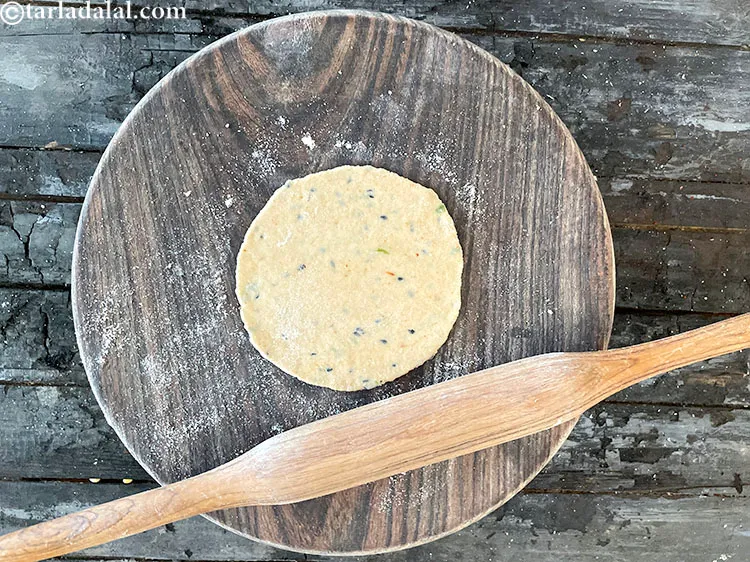 Step 26 – Roll out each portion into a 75 mm. (3&rdquo;) diameter circle using a little whole …