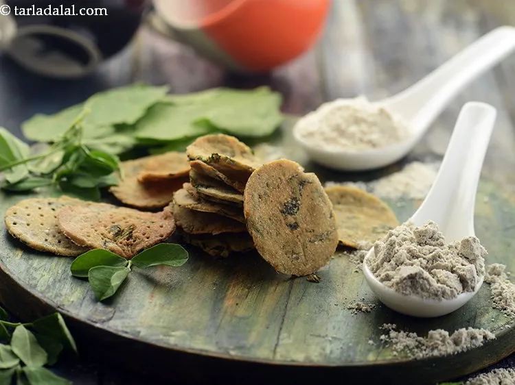 Step 19 – Store the <strong>baked palak methi puri </strong>in an airtight container. <strong><a href="https://www.tarladalal.com/Baked-Oats-Puri-39887r" target="_blank">Baked Oats Puri</a></strong>, …