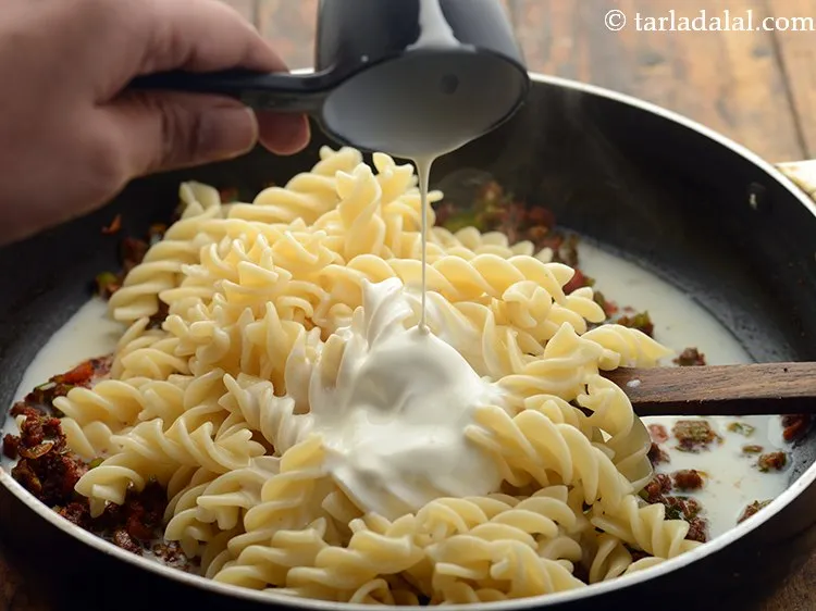 Step 25 – Add fresh cream to give a rich, creamy taste.