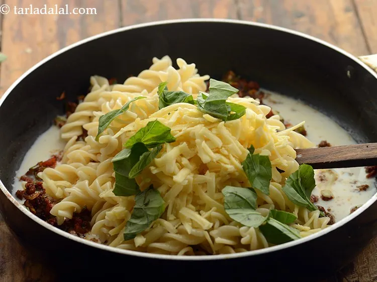 Step 27 – Add basil. When a recipe calls for fresh basil, tear it with your fingers rather …