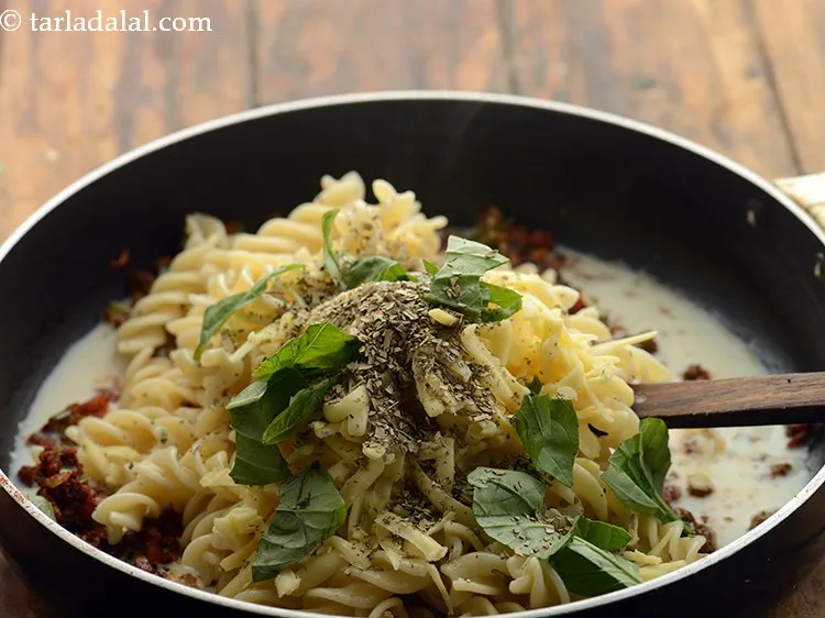 Step 28 – Add oregano. Add whatever herbs are easily available and you would like to enhance the …