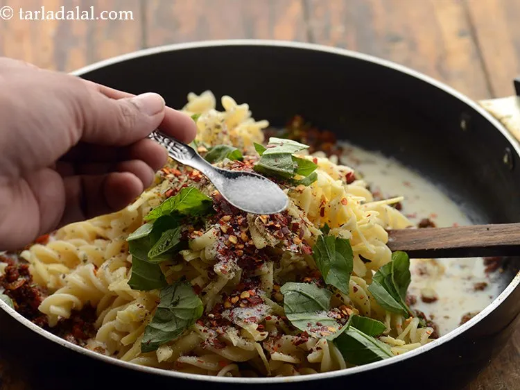 Step 30 – Add salt. We have added salt while boiling the pasta, butter and cheese both contain …