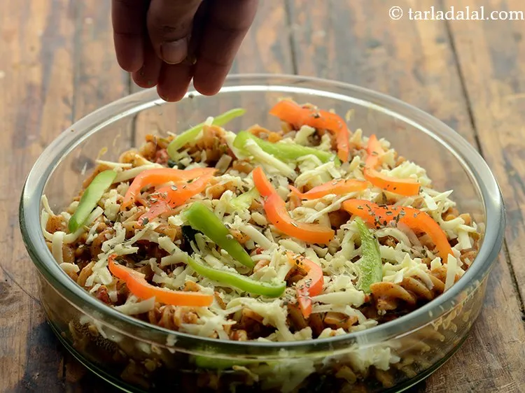 Step 35 – Sprinkle a little oregano evenly over it.&nbsp;