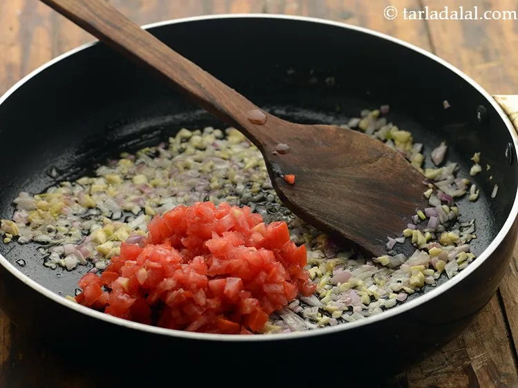 Step 16 – Add tomatoes. If you are lazy to chop then simply puree them to a paste …