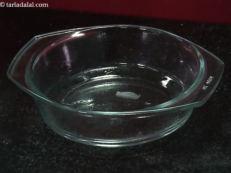 Step 7 – Grease a baking dish lightly with oil or butter.
