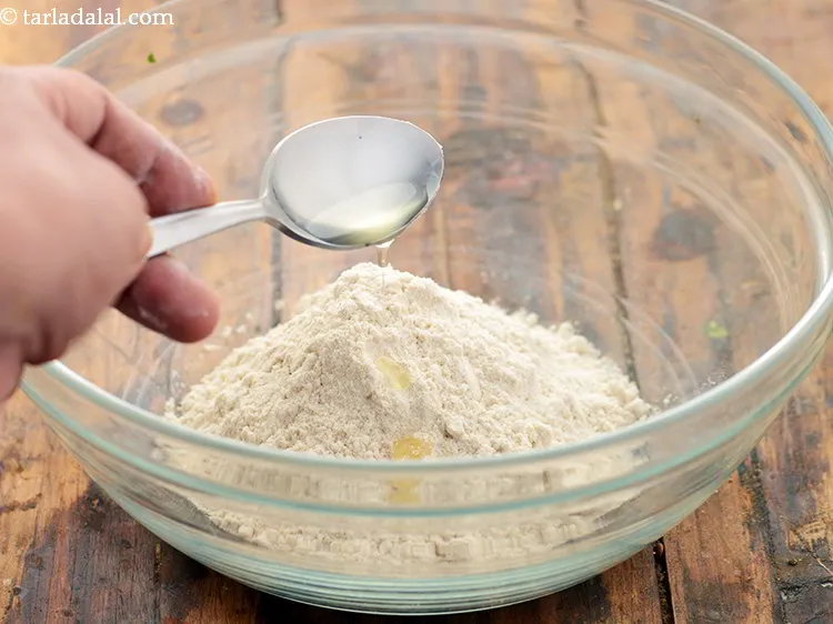 Step 3 – Add the oil. Ghee/Olive oil can also be added as Moyan for the healthy papdi …