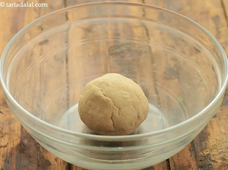 Step 7 – Knead well to make a smooth stiff dough.