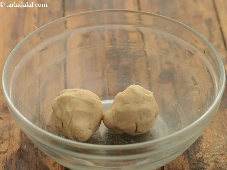 Step 8 – To make&nbsp;<strong>baked papdi |&nbsp;baked puris |&nbsp;homemade baked papdi | healthy baked&nbsp;puri |&nbsp;</strong>divide the dough into …