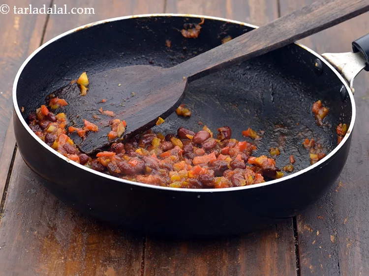 Step 60 – Mix well while mashing it lightly with the back of a spoon and cook on …