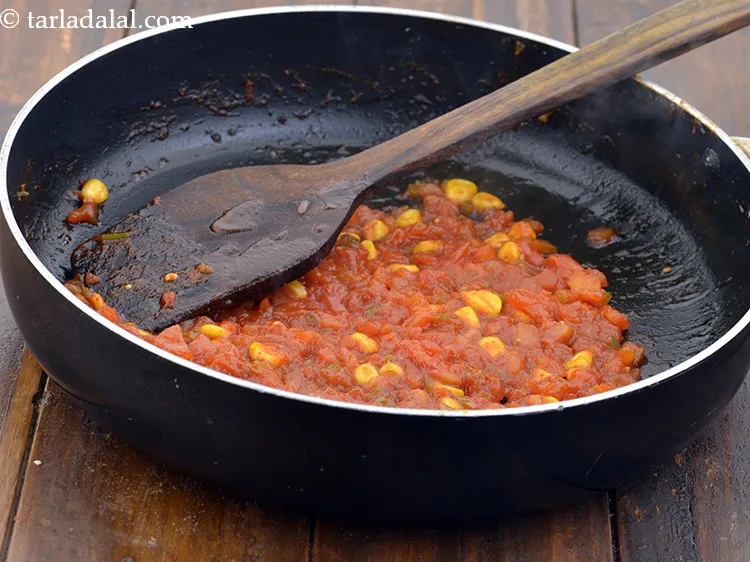 Step 41 – Mix well while mashing it with the back of a spoon and cook on a …