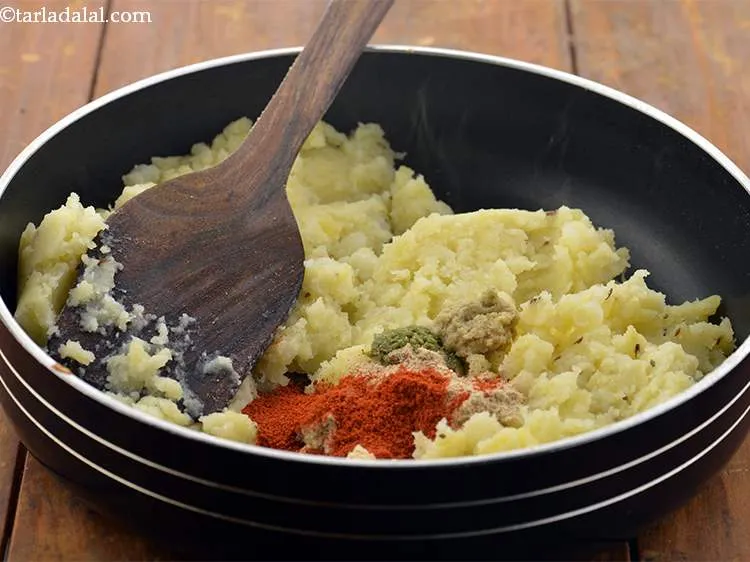 Step 18 – Add the chilli powder to the&nbsp;<strong>Baked Samosa filling</strong>. You can adjust the quantity as per …