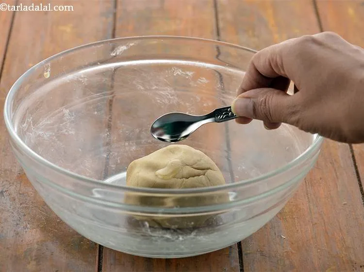 Step 7 – Knead&nbsp;<strong>Baked Samosa dough&nbsp;</strong>using &frac14; tsp oil till smooth.
