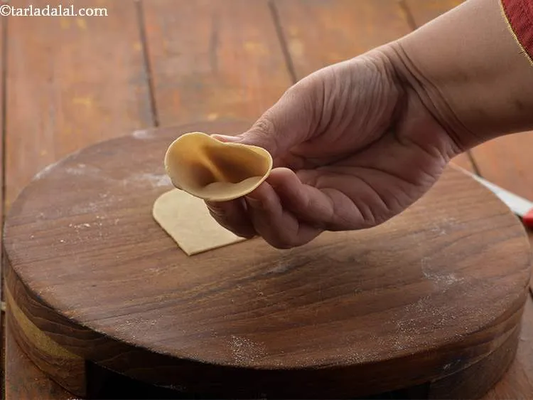 Step 25 – Make a cone from each half.