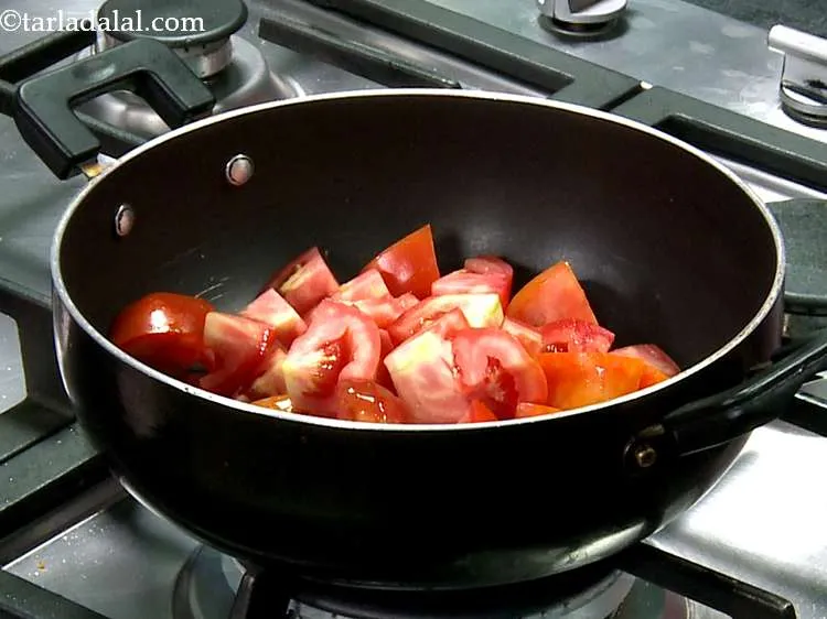 Step 5 – For the tomato sauce, put the tomatoes in a deep non-stick pan.