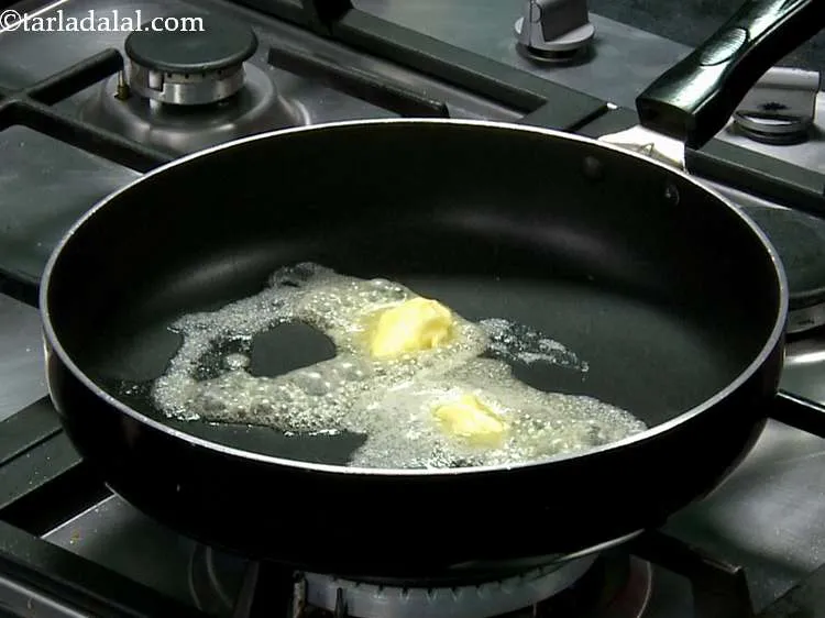 Step 9 – Heat 2 tbsp of butter in a broad non-stick pan.