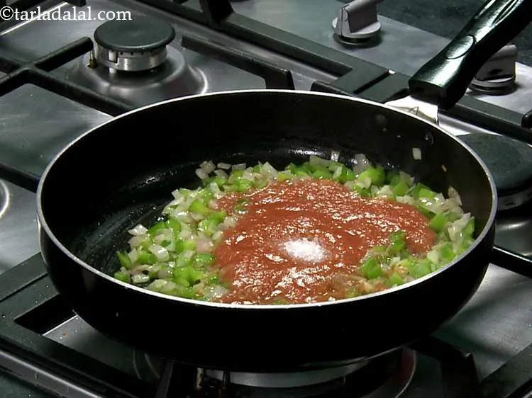 Step 15 – Add sugar. This will remove the tanginess and lightly sweeten the tomato sauce.