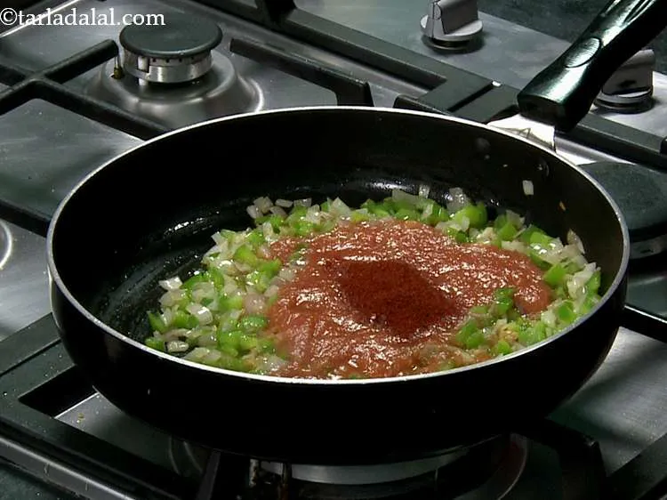 Step 16 – Add the chilli powder. Instead of chilli powder you can use dry red chilli flakes.