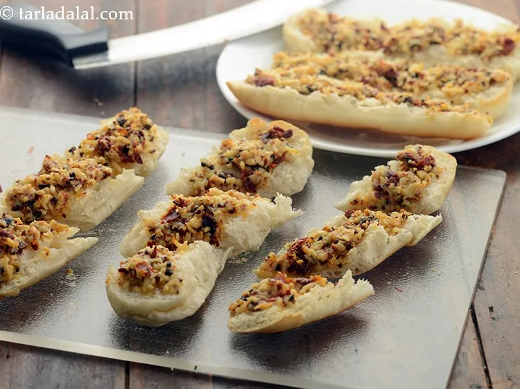 Step 16 – Cut the baked sun-dried tomatoes and cheese rolls into pieces.