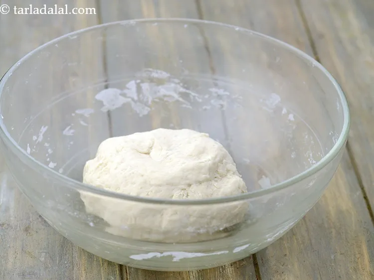 Step 21 – Knead it into soft dough using approx. &frac12; cup of warm water. The quantity of …