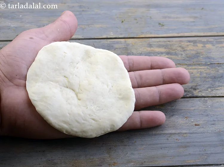 Step 39 – Flatten it into a 100 mm. (4&rdquo;) diameter circle and place it on your palms.