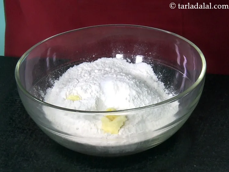 Step 17 – Add 1 tbsp&nbsp;<a href="https://www.tarladalal.com/glossary-soft-butter-naram-makhan-1942i">soft butter</a>.