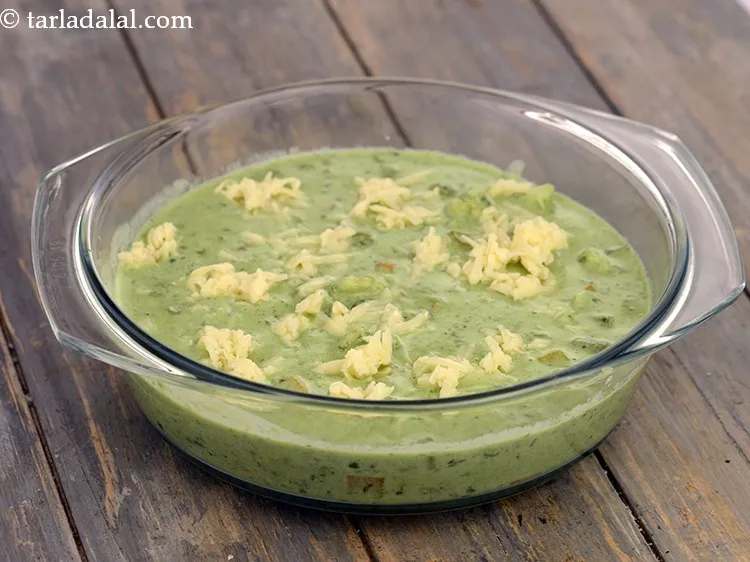 Step 36 – Sprinkle 1/4 cup&nbsp;<a href="https://www.tarladalal.com/glossary-grated-processed-cheese-868i">grated processed cheese</a> all over it.&nbsp;