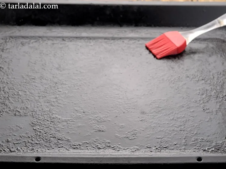 Step 14 – Grease a baking tray using oil. You can also line the tray with parchment paper …