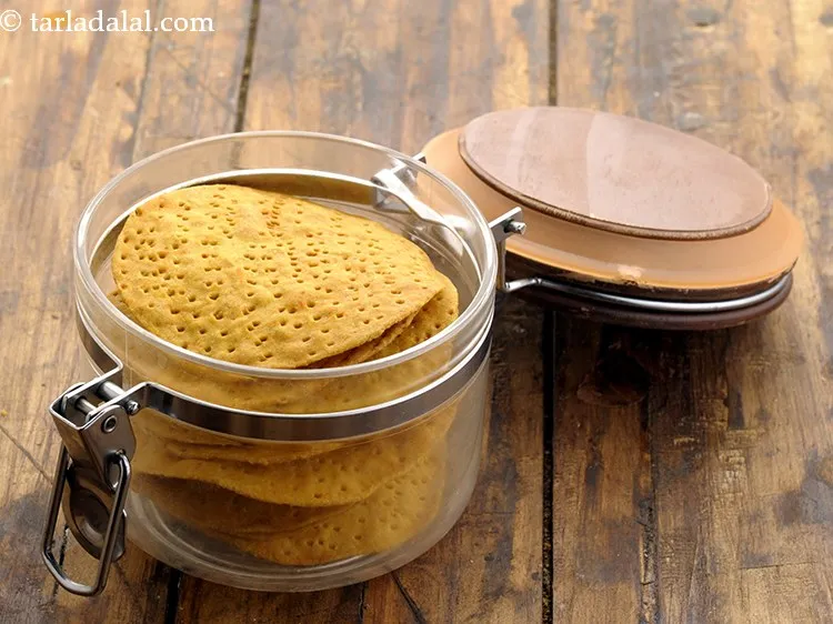 Step 17 – Cool the <strong>baked atta puri</strong> and store in an air-tight container.
