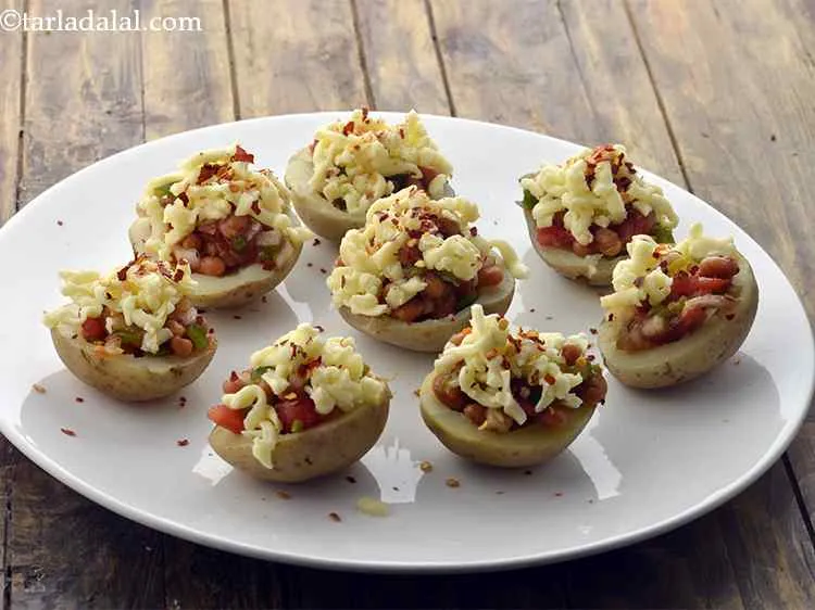Step 14 – Add little chilli flakes on each potato halve. They spice up the potatoes.