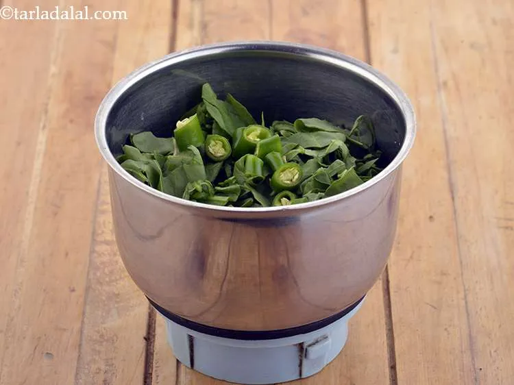 Step 2 – Add the green chillies. You can even add garlic if you wish to.