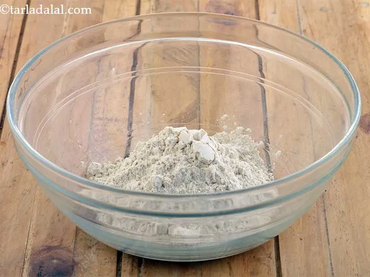 Step 4 – Take whole wheat flour in a deep bowl.