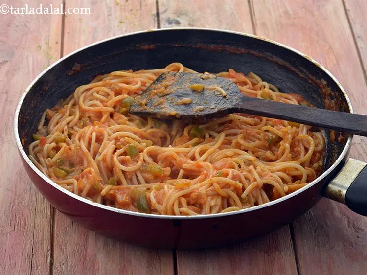 Step 21 – Now mix gently and cook on a medium flame for 1 minute, while stirring occasionally.