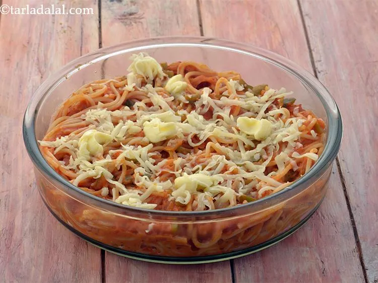 Step 24 – Dot it with dollops of butter.