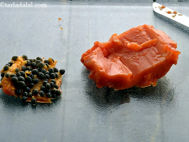 Step 8 – Cut the papaya into 2 vertically or horizontally. Deseed the papaya using a spoon. Ensure …