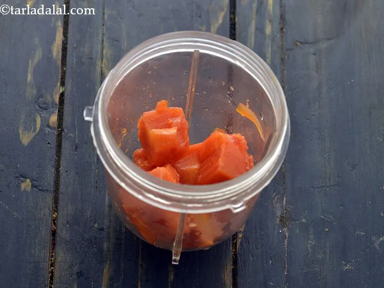 Step 10 – Place the papaya in a small mixer jar.