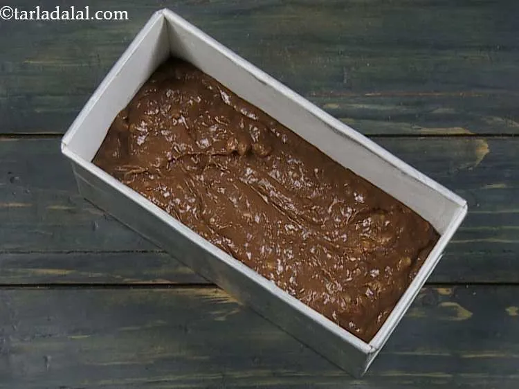 Step 17 – Pour the batter into a greased and dusted 150 mm. (6") x 87 mm. (3? …