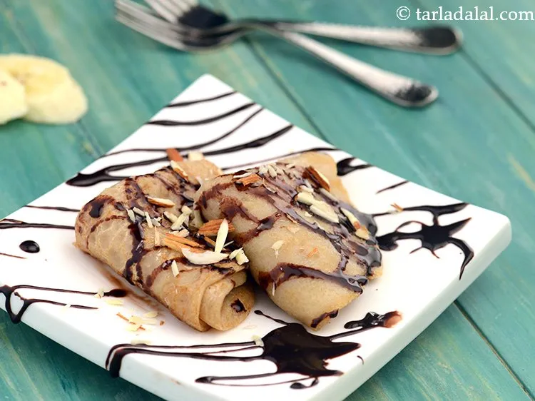 Step 19 – Serve the delicious homemade Indian chocolate banana pancake&nbsp;immediately. You can top with some chocolate chips, …