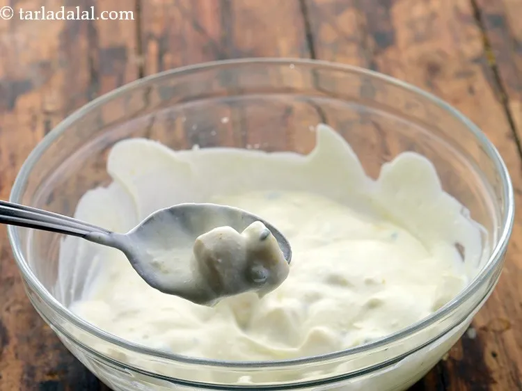 Step 12 – Mix&nbsp;<strong>banana raita | kele ka raita |&nbsp;</strong>well using a spoon.
