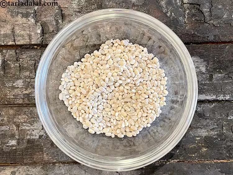 Step 3 – To cook barley, add 1/2 cup&nbsp;<a href="https://www.tarladalal.com/glossary-barley-jau-jao-184i">barley (jau)</a> in a pressure cooker.