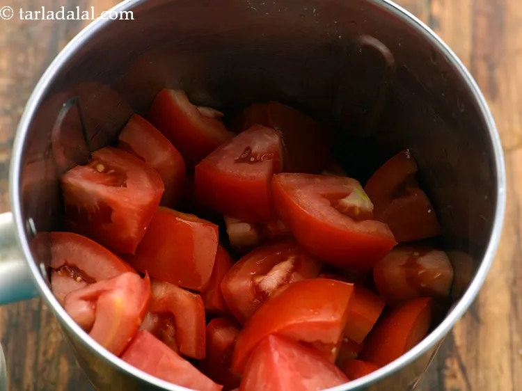 Step 2 – To prepare&nbsp;<strong>Kolhapuri gravy recipe |&nbsp;&nbsp;Maharashtrian&nbsp;Kolhapuri gravy |&nbsp;basic Kolhapuri gravy |</strong>&nbsp;take tomatoes in a mixer jar. …