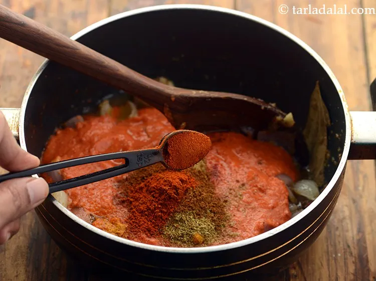 Step 24 – Add <a href="https://www.tarladalal.com/Malvani-Masala-Homemade-Maharashtrian-Malvani-Masala-42269r" target="_blank">malvani masala</a>. Similarly, prepare aromatic&nbsp;at home and add to make <strong>delicious Kolhapuri …