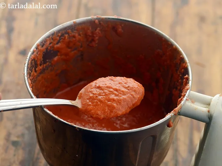 Step 8 – Add 2 tbsp of water and blend in a mixer to smooth paste. Keep aside.