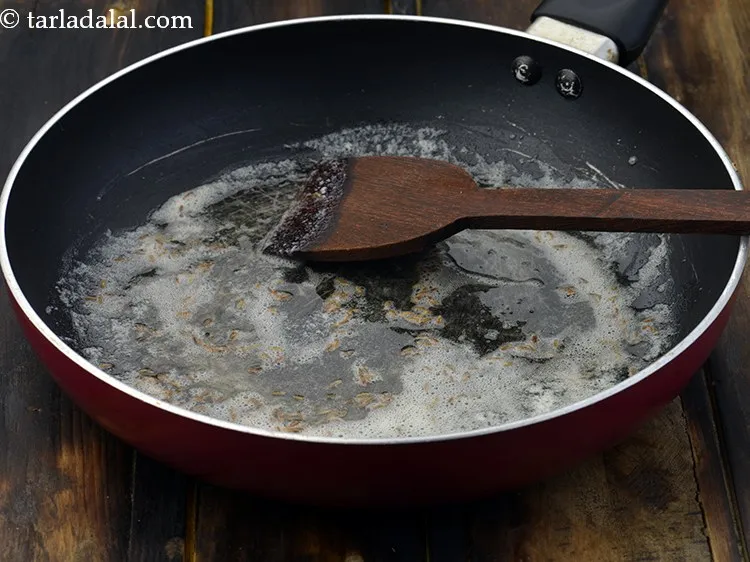 Step 7 – Add cumin seeds and saut&eacute; on a medium flame for a few seconds.