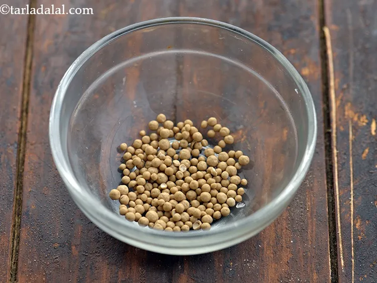Step 7 – For the homemade pizza dough recipe, in a small bowl take dry yeast.