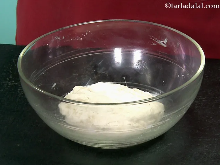 Step 13 – Knead into a soft, smooth dough. Shape the dough into a proper round using both …