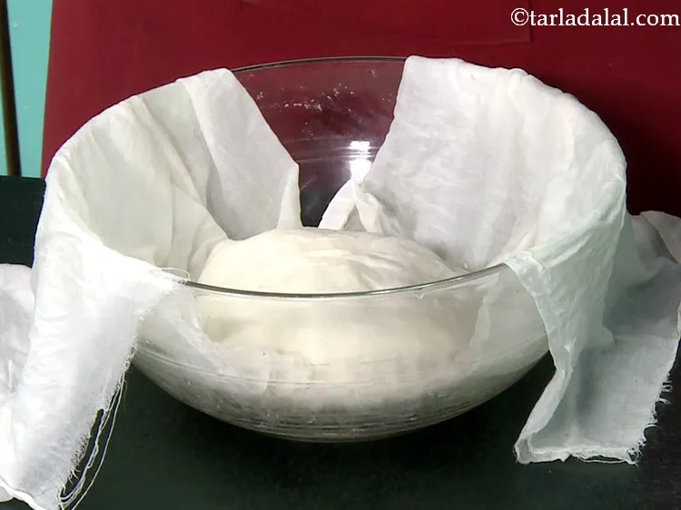Step 14 – Cover the dough with a wet muslin cloth and keep aside for 1 hour in …