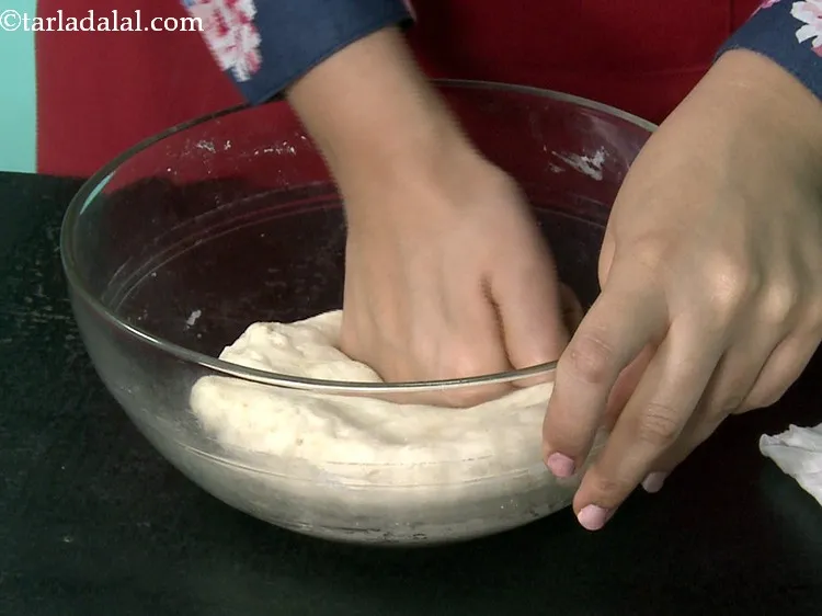 Step 42 – Press the dough lightly to remove the air.